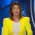 Norah’s yellow puff sleeve blazer on CBS Evening News