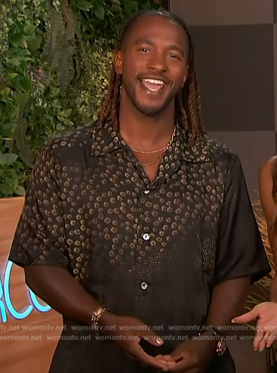 Scott’s black floral print shirt on Access Hollywood