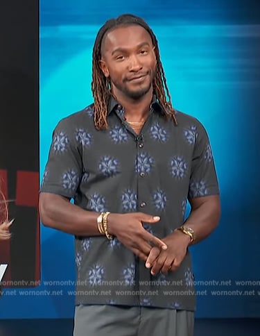 Scott's black floral print shirt on Access Hollywood