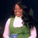 Sherri Shepard’s white turtleneck top and green dress on The View