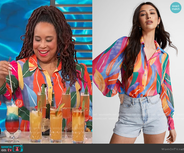 Icone Bright sheer blouse worn by Pia Days on Access Hollywood