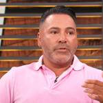 Oscar de la Hoya’s pink polo on Access Hollywood