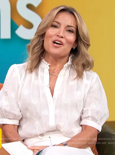 Kit’s white short sleeve embroidered shirt on Access Hollywood