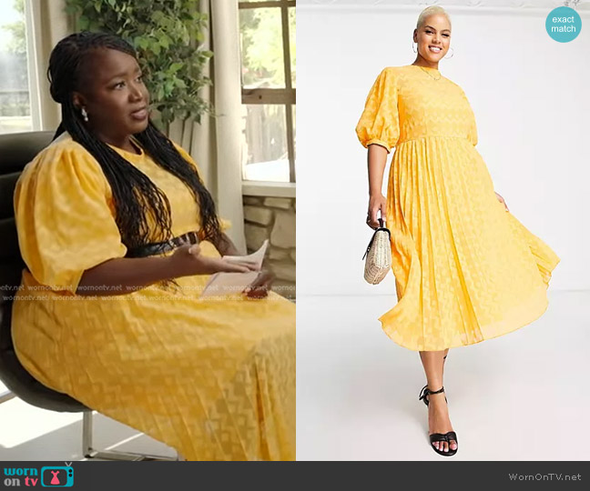 Asos Curve Pleated Chevron Textured Dress with puff sleeve in orange worn by Kelley L. Carter on Good Morning America