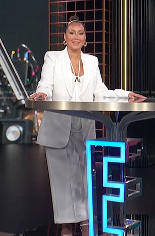 Adrienne’s white shawl collar blazer and pants on E! News