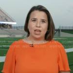 Andrea Lucia’s orange top on CBS Mornings