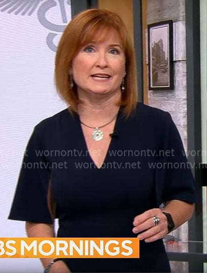 Anna Werner’s navy v-neck dress on CBS Mornings