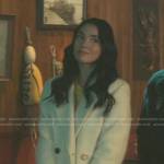 Bess’s white long coat on Nancy Drew