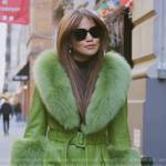 Brynn’s green leather fur trim coat on The Real Housewives of New York City