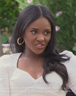 Charity's white crochet knit sweater on The Bachelorette