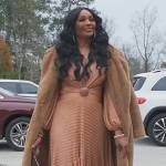 Cynthia’s beige side cutouts dress on The Real Housewives of Atlanta