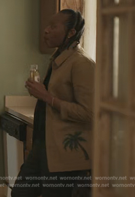 Dre's khaki palm print shirt on The Chi