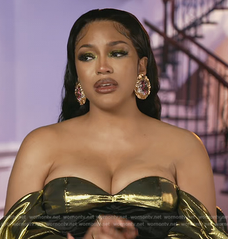 Drew's metallic confessional dress on The Real Housewives of Atlanta