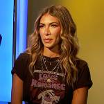 Erin’s black Love and Romance graphic tee on E! News