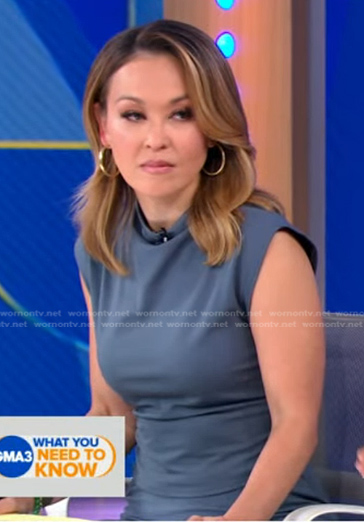 Eva’s grey mock neck top and skirt on Good Morning America