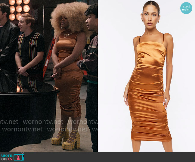 Kourtney’s orange satin ruched dress on High School Musical The Musical The Series