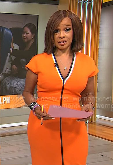 Gayle's orange v-neck dress with black trim on CBS This Morning