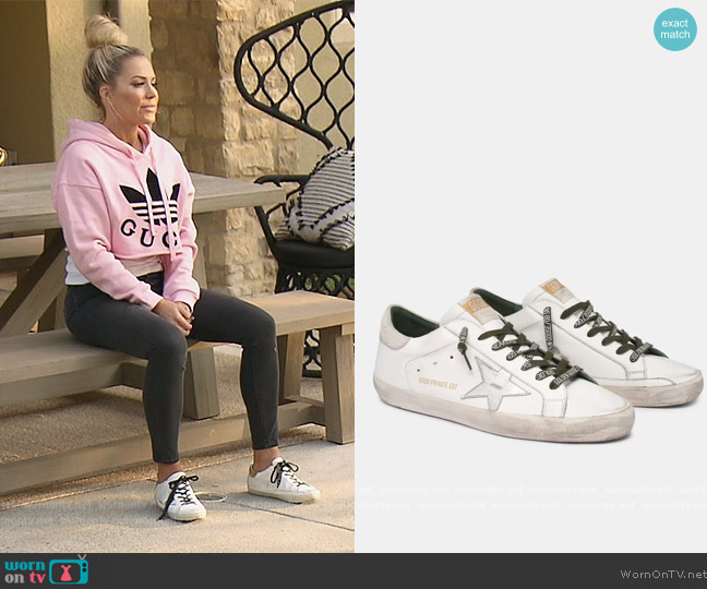 Golden Goose White Super-Star sneakers with silver star worn by Jennifer Pedranti on The Real Housewives of Orange County