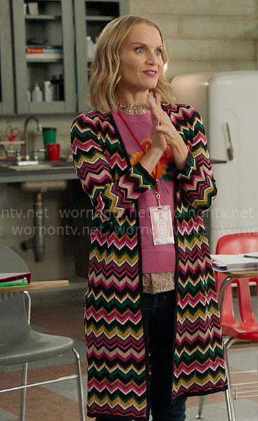 Miss Jenn's pink flower sweater and chevron striped cardigan on High School Musical The Musical The Series