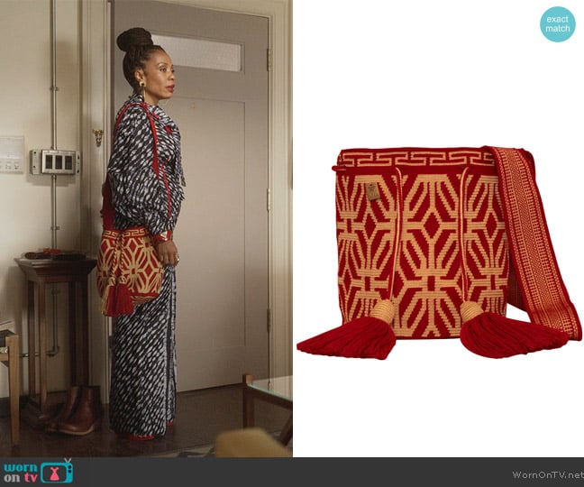 Nya’s red tassel tie bag on And Just Like That