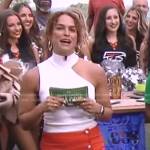 Jess Sims’s white asymmetric top and red tweed skirt on Good Morning America