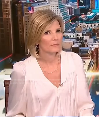 Kate Snow's white v-neck blouse on NBC News