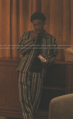 Kevin's black striped jacket and pants on The Chi