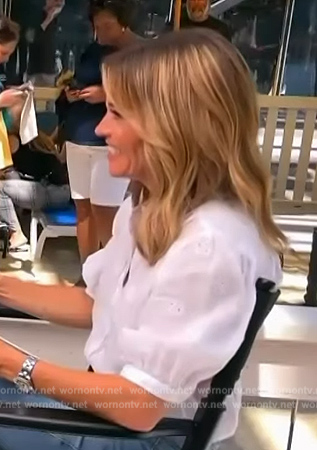 Kit’s white embroidered short sleeve top on Access Hollywood