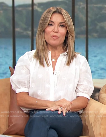 Kit's white embroidered short sleeve top on Access Hollywood