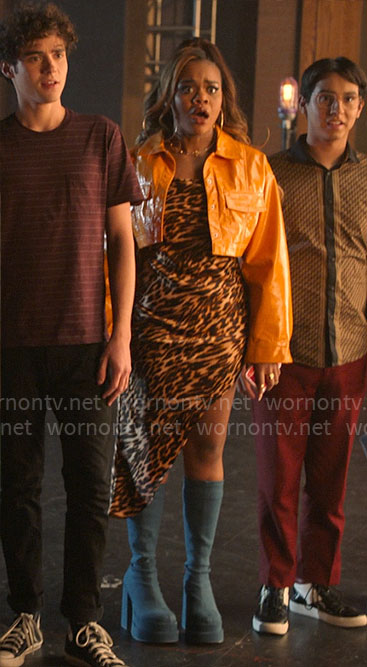Kourtney's leopard print asymmetric dress and cropped orange leather jacket on High School Musical The Musical The Series
