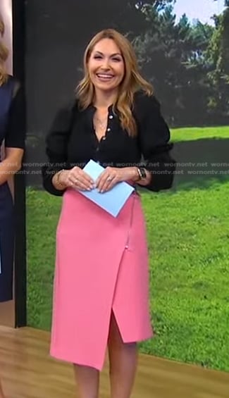 Lori’s black top and pink asymmetric skirt on Good Morning America