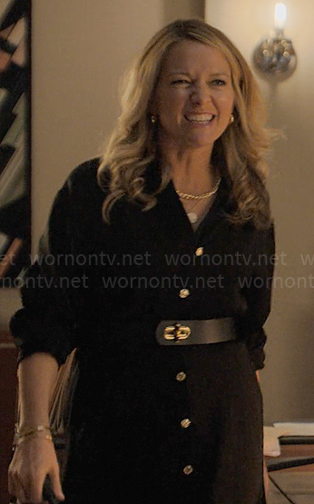 Lorna's black dress with gold button front on The Lincoln Lawyer