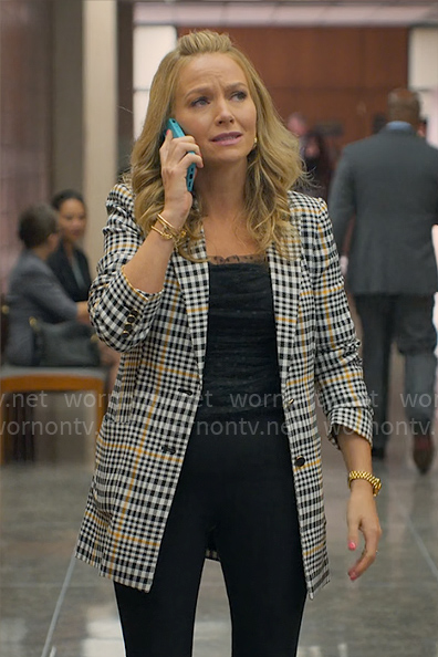 Lorna's plaid jacket and black mesh top on The Lincoln Lawyer