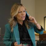 Lorna’s teal blazer and mixed plaid skirt on The Lincoln Lawyer