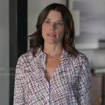 Maggie’s printed button down blouse and black pencil skirt on The Lincoln Lawyer