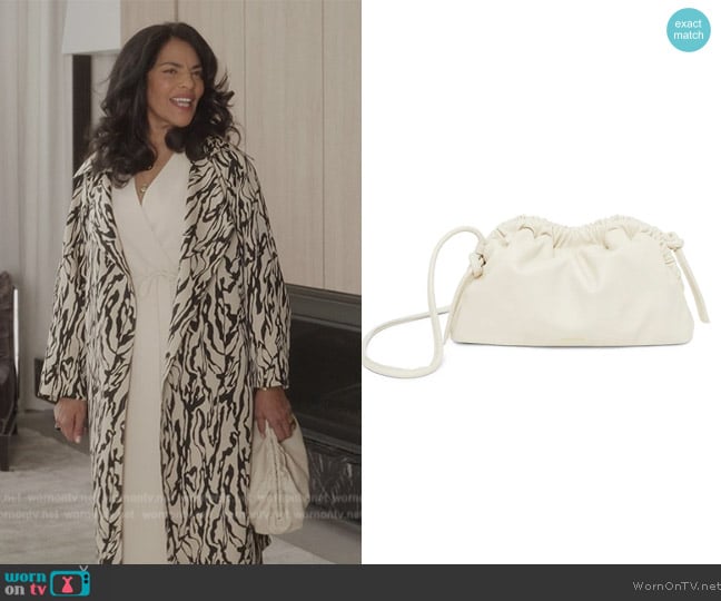 Mansur Gavriel Mini Cloud Leather Clutch worn by Seema Patel (Sarita Choudhury) on And Just Like That