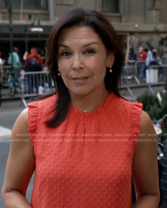 Meg Oliver’s red ruffled swiss dot top on CBS Evening News