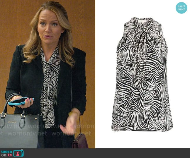 MICHAEL Michael Kors Zebra-print pussy-bow blouse worn by Lorna Crane (Becki Newton) on The Lincoln Lawyer