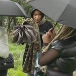 Monyetta black and green rain boots on The Real Housewives of Atlanta