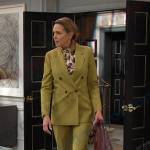 Nicole’s floral blouse and green suit on Days of our Lives