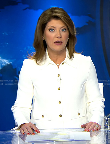 Norah's white button jacket on CBS Evening News