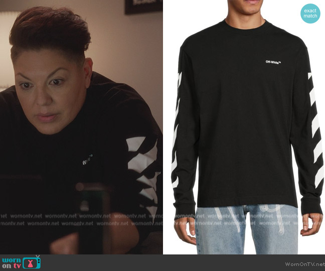 Off-White Diagonal Helvetica oversized sweatshirt worn by Che Diaz (Sara Ramirez) on And Just Like That