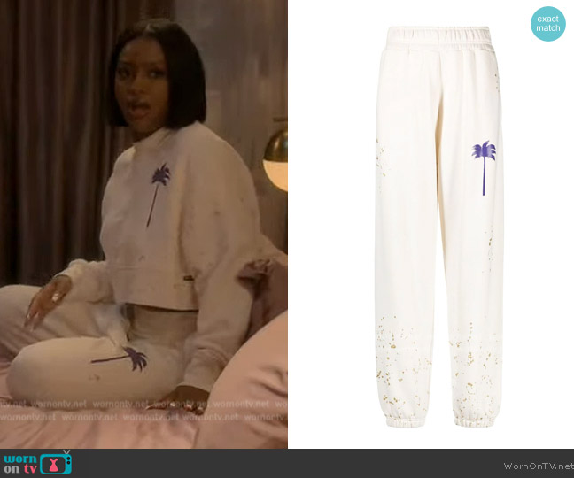 Palm Angeles Palm tree-print track pants worn by Annika (Justine Skye) on Grown-ish