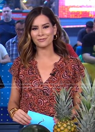 Rebecca’s orange print top on Good Morning America