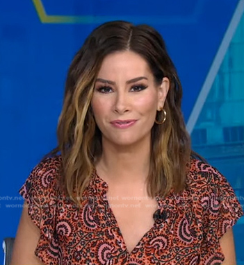 Rebecca’s orange print top on Good Morning America