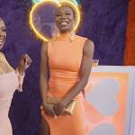 Sanya’s orange sleeveless split dress on The Real Housewives of Atlanta