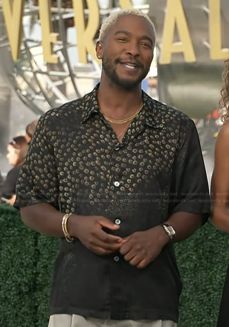 Scott's black floral print shirt on Access Hollywood