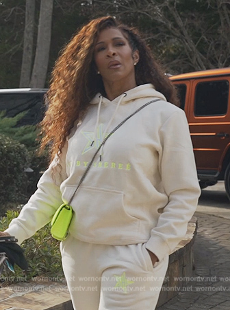 Sheree's white logo hoodie and neon bag on The Real Housewives of Atlanta