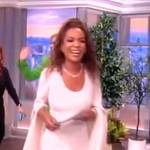 Sunny’s white split sleeve mini dress on The View