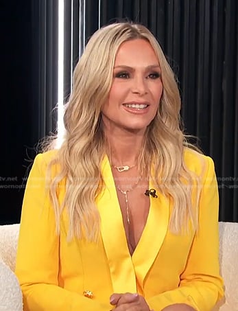 Tamra Judge's yellow blazer dress and heel sandals on E! News